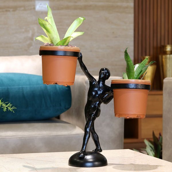 Human Sculpture Holding Pot Stand